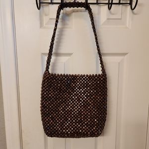 The sak wood beaded bag